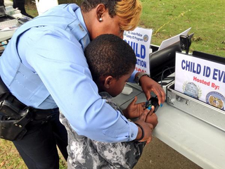 Illustration for article titled Today, the Community Outreach Unit is providing EZ Child ID kits...